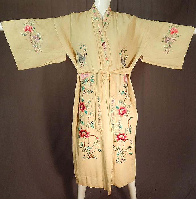 Vintage Chinese Yellow Silk Colorful Embroidered Duck Bird Belted Kimono Robe
It is made of a pastel yellow silk crepe de chine fabric, with colorful raised padded satin stitch hand embroidered flowers, birds and a large Mandarin duck on the back. 