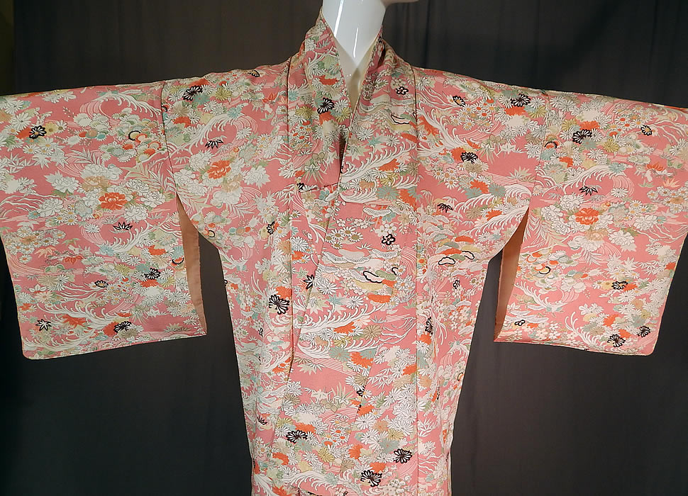 Vintage Japanese Geisha Pink Silk Screen Floral Water Waves Kimono
The kimono measures 57 inches long, with a 40 inch chest, 40 inch waist and 19 inch long sleeves. 