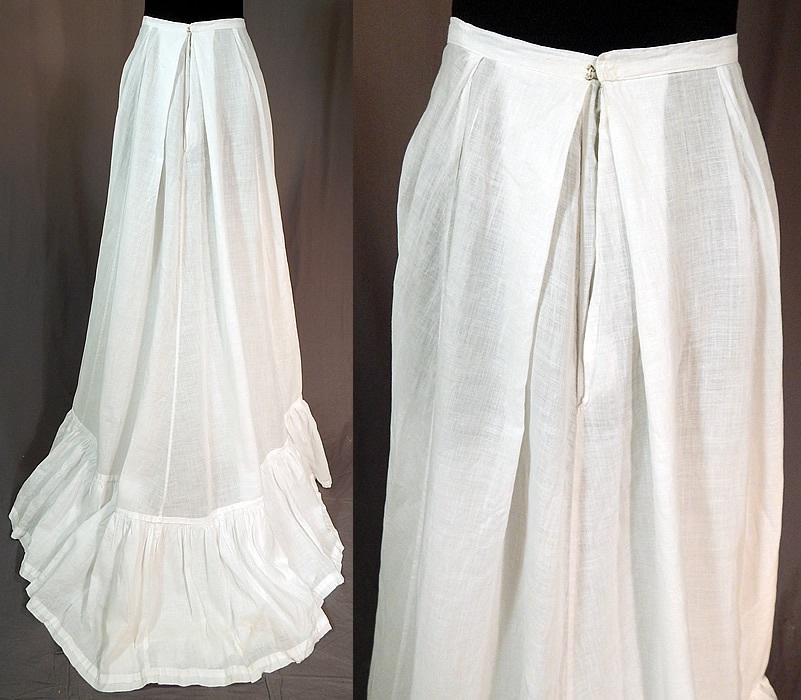Victorian White Cotton Batiste Ruffle Back Train Wedding Skirt Petticoat
This beautiful bridal wedding petticoat skirt is a long floor length, with a back train, layered bottom ruffle, fitted waistband with pleated back, hook closure and is unlined. 