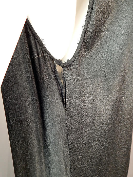 Vintage Black Silk Crepe de Chine Knotted Fringe Flapper Tabard Tunic Dress
It is in fair as-is condition, with a frayed split under one arm and back shoulder (see close-ups). This is truly a wonderful piece of wearable textile art which could be restored or used for display and design inspiration! 