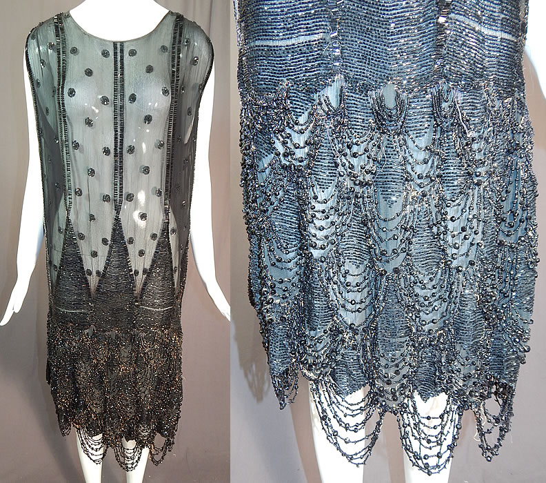 Vintage Art Deco Black Silk Sequin Polka Dot Jet Beaded Fringe Flapper Dress
This amazing Art Deco vintage black silk sequin polka dot jet beaded fringe flapper dress dates from the 1920s. It is made of a sheer black silk chiffon fabric, with black sequined polka dots on the top and jet black bugle beaded stripes, zigzag designs and heavily beaded scalloped layered loop fringe along the bottom skirt.