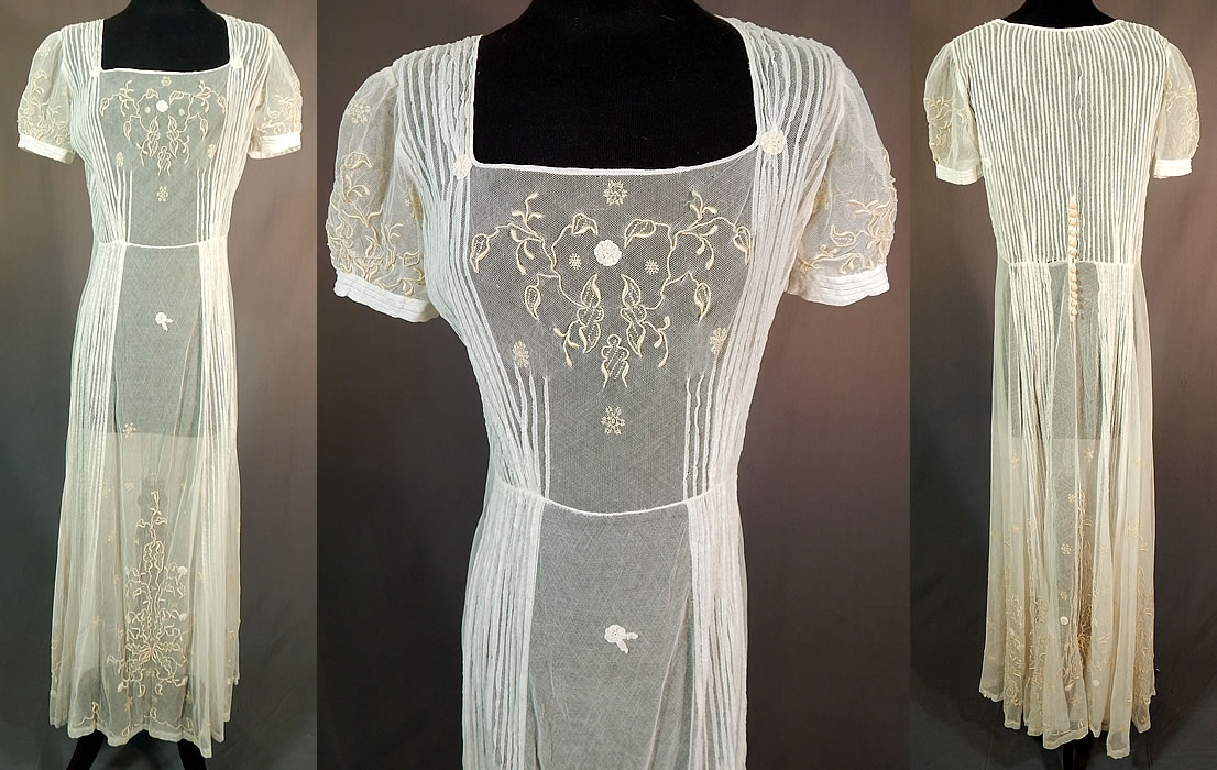 Vintage White Tulle Net Pintuck Pleat Embroidered Lace Applique Maxi Dress
This vintage white tulle net pintuck pleat embroidered lace appliqu&eacute; maxi dress dates from the 1930s.  The dress measures 51 inches long, with a 36 inch bust and 28 inch waist.