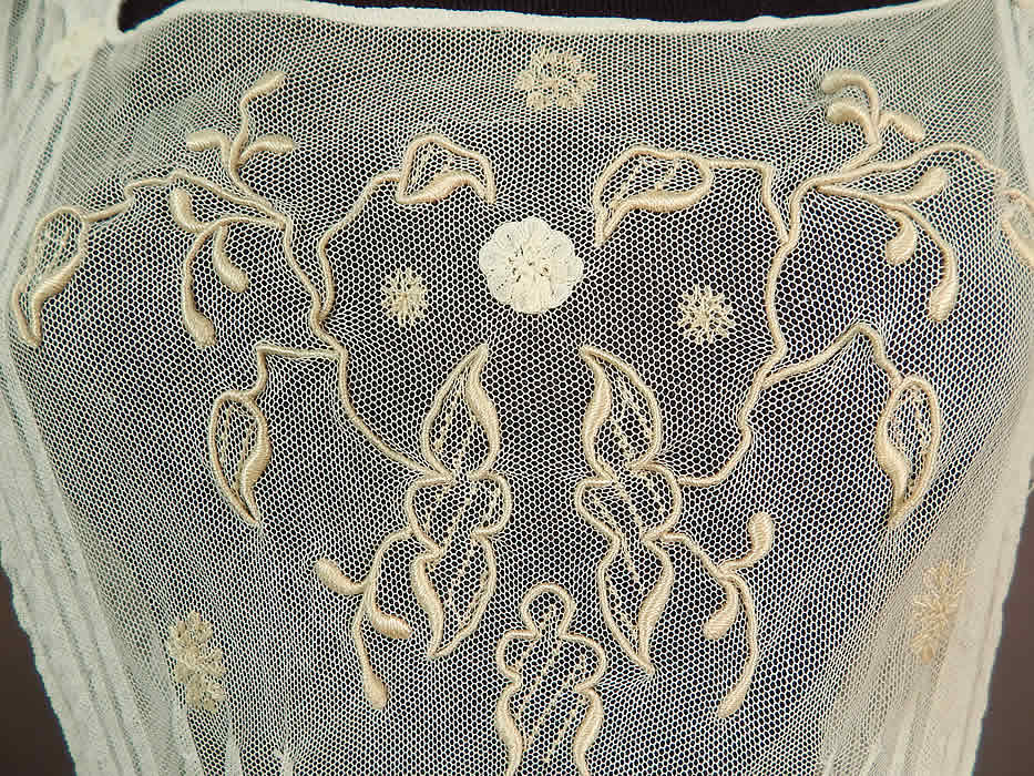 Vintage White Tulle Net Pintuck Pleat Embroidered Lace Applique Maxi Dress
It is made of a white sheer tulle net lace fabric with pintuck pleats, raised padded satin stitch embroidery work, stitched snowflakes and tiny lace rosette appliques. 