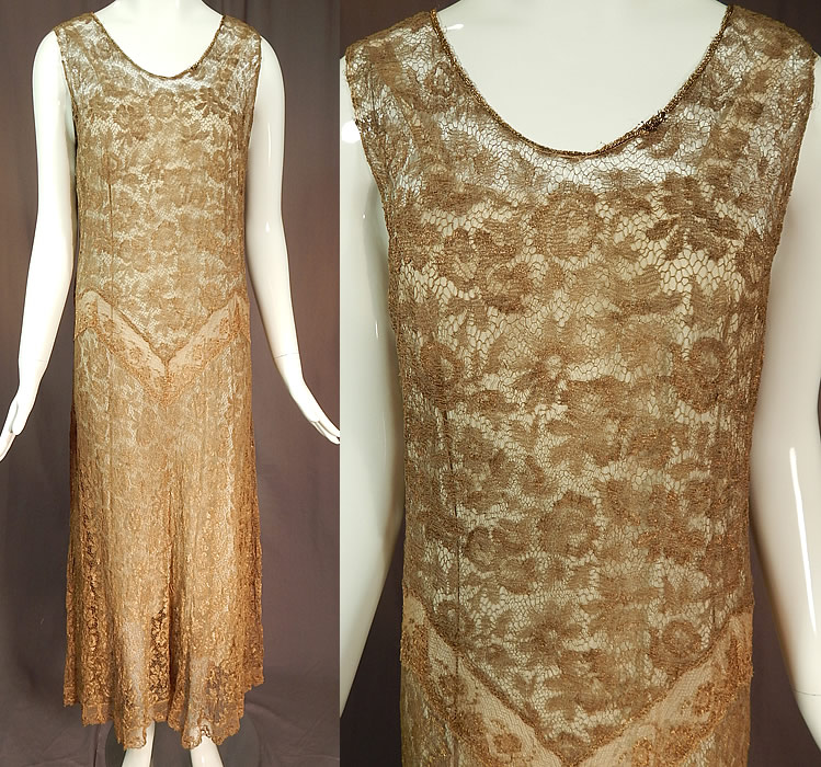 Vintage Gold Metallic Lam&eacute; Lame Lace Drop Waist Flapper Dress & Gray Silk Slip
This exquisite vintage gold metallic lam&eacute; lace drop waist flapper dress and gray silk slip dates from the 1920s. It is made of a sheer fine gold metallic thread lam&eacute; lace net fabric woven into a floral rose leaf pattern.
