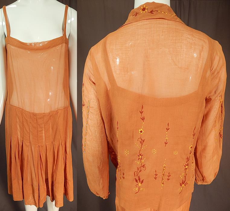 Vintage Brown Cotton French Knot Embroidery Boho Peasant Slip Dress & Blouse
The dress measures 38 inches long, with a 34 inch bust and 32 inch waist. There is a matching fabric shirt blouse with a loose fitting long length, fold over collar V front neckline, long full sleeves with fitted cuffs and is sheer, unlined. 