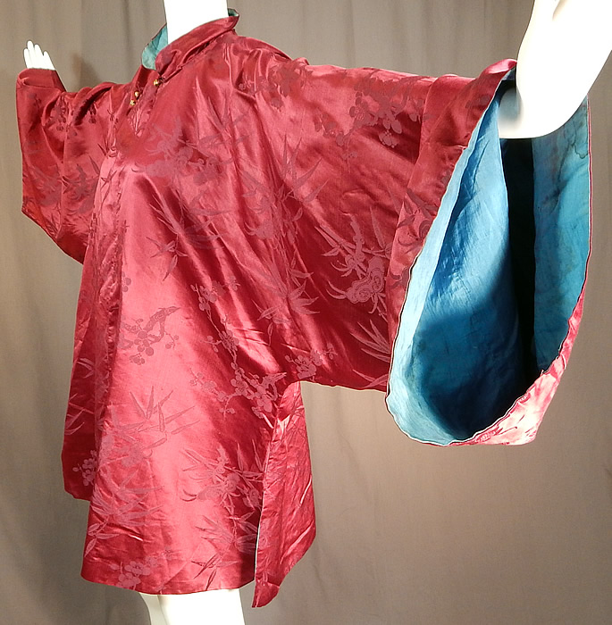 Antique Chinese Red Silk Damask Cherry Blossom Bamboo Brocade Magua Robe
This antique Chinese red silk damask cherry blossom bamboo brocade magua robe dates from the 1900 during the Qing Dynasty.
