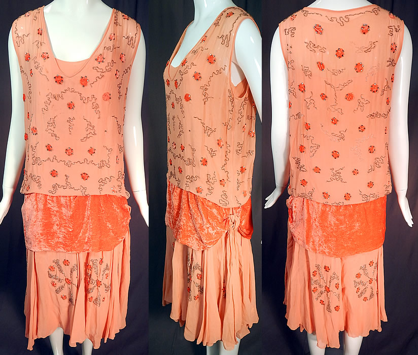 Vintage Art Deco Orange Silk Velvet Applique Rhinestone Beaded Flapper Dress
This amazing Art Deco vintage orange silk velvet appliqu&eacute; rhinestone beaded flapper dress dates from the 1920s. It is made of a pastel orange sherbet color sheer silk chiffon fabric, with orange velvet cut out circle appliques trimmed in rhinestones and silver beaded swirls, circular decorative designs. 