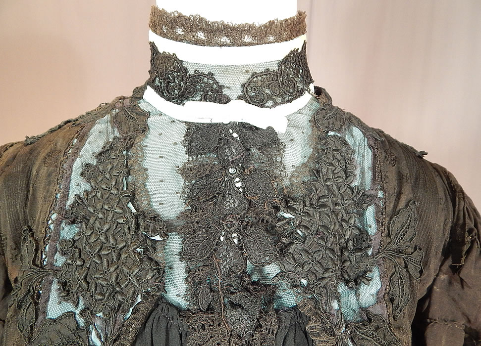 Victorian Black Silk Damask Embroidered Lace Applique Bodice Skirt Train Gown
The bodice measures 17 inches long, with a 36 inch bust, 26 inch waist, 22 inch long sleeves and a 12 inch neck. There is a matching fabric, long floor length skirt, with slight train back, hook closure on the back and is fully lined. The skirt measures 40 inches long in the front, 50 inches long in the back, with a 26 inch waist. It is in good condition, with only some fraying splits on the inside silk lining the sleeves and skirt. It is truly a wonderful piece of antique Victoriana wearable art!