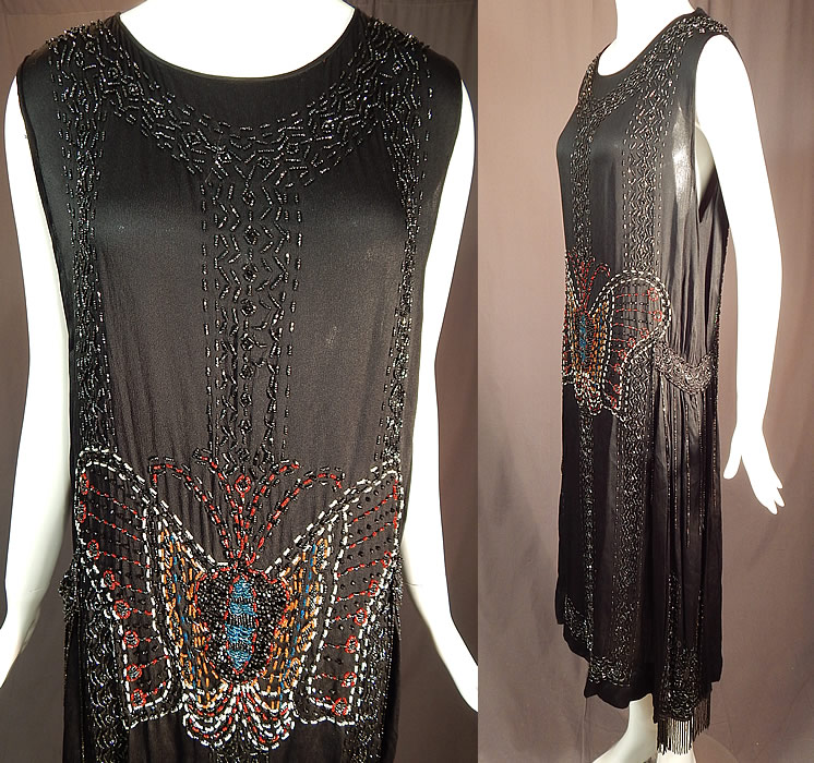 Vintage Art Deco Black Silk Colorful Beaded Butterfly Fringed Flapper Dress
There are pearl beaded accents on the back butterfly and black beaded fringe along the sides. 