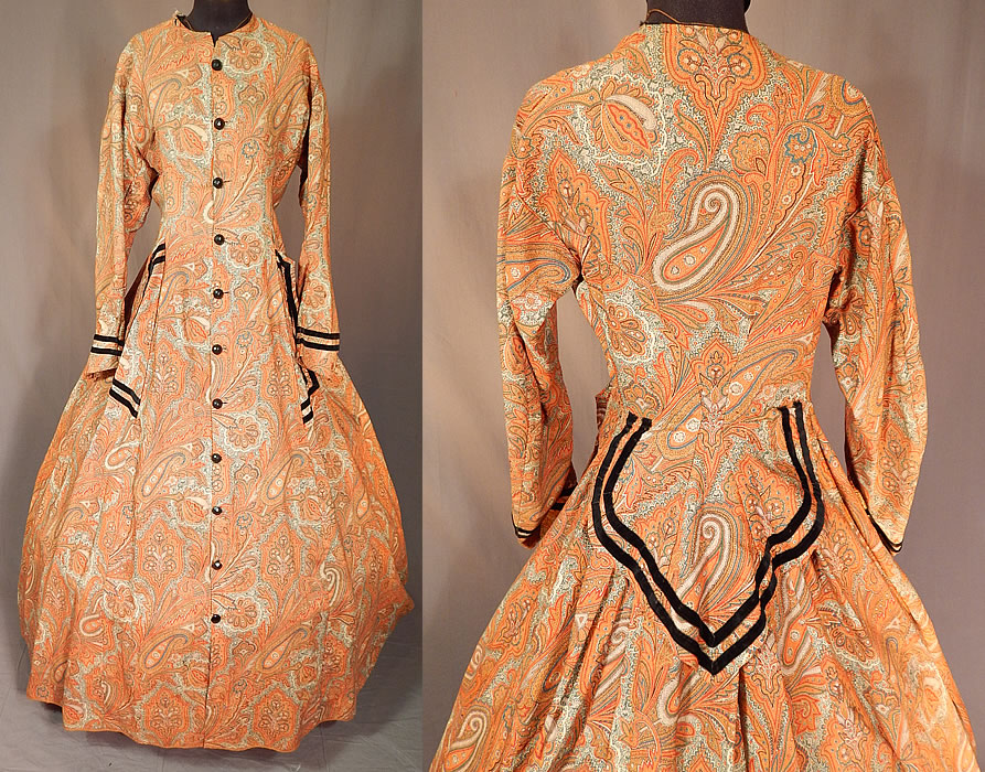 Victorian Civil War Era Paisley Wool Hoop Skirt Morning Wrapper Gown Dress
This antique Victorian Civil War era paisley wool hoop skirt morning wrapper gown dress dates from the 1860s. It is made of autumn fall shades of brown, orange, red, blue and cream color fine woven wool paisley print pattern fabric