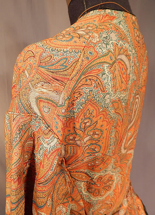 Victorian Civil War Era Paisley Wool Hoop Skirt Morning Wrapper Gown Dress
It is in fair as-is condition, missing the original buttons, has a small patched repair on the front top, some fraying around the neckline and several small frays in the fabric on the shoulder, back skirt, side pocket and underarm (see close-ups). This is truly a wonderful piece of antique Victoriana textile art!
