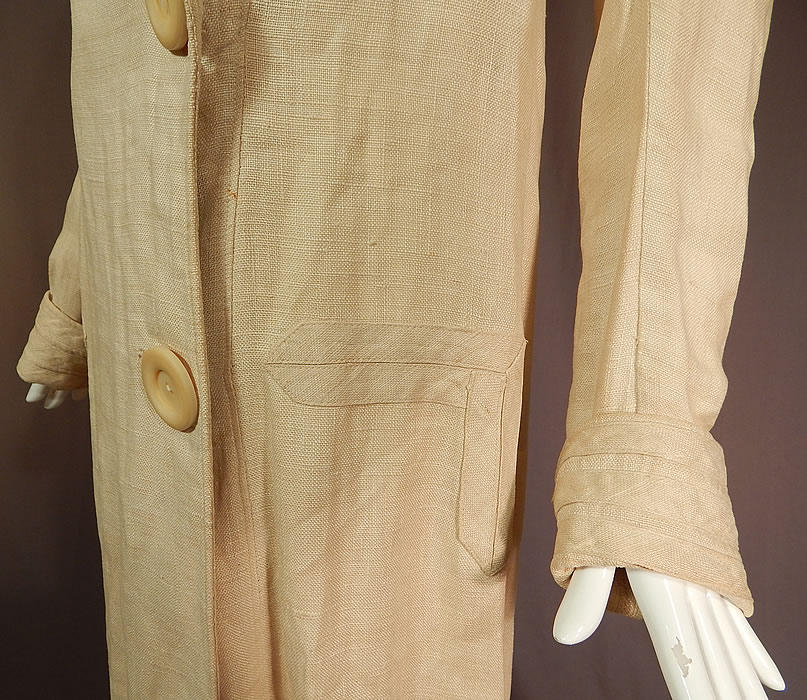 Vintage Ecru Linen Sailor Shawl Collar Womens Duster Driving Motoring Coat
The coat measures 50 inches long, with a 38 inch bust, 34 inch waist, 14 inch back and 25 inch long sleeves. 