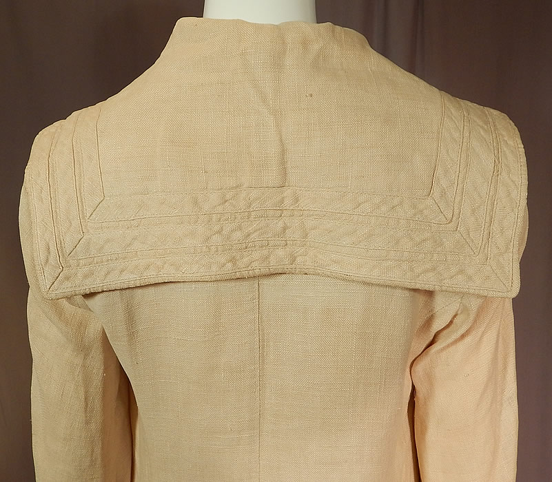 Vintage Ecru Linen Sailor Shawl Collar Womens Duster Driving Motoring Coat
This coat would have been worn to protect ones clothing from the dust and mud when traveling, riding and driving in a motor car. It is in good condition, with only a small woven mended repair on the back skirt which is difficult to see. This is truly a wonderful piece of wearable womens outerwear textile art!