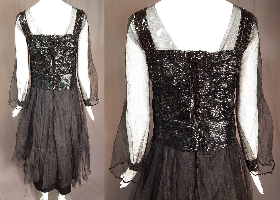 Vintage Art Deco Black Silk Tulle Net Sequin Beaded Evening Gown Flapper Dress
The dress measures 47 inches long, with a 34 inch bust and 32 inch waist. It is in good as-is condition, with some fraying along the bottom skirt hemlines, a few tiny holes in the tulle net fabric and some missing loose sequins. This is truly a wonderful piece of wearable Art Deco textile art!