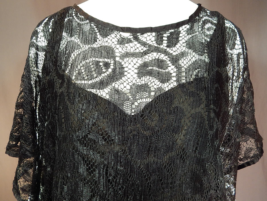 Vintage Art Deco Black Silk Sheer Lace Batwing Blouse Flapper Fringe Tassel Top
The blouse measures 28 inches long, with a 44 inch bust and 40 inch waist. It is in good condition, with only a small frayed hole in the lace on the front neckline (see close-up). 