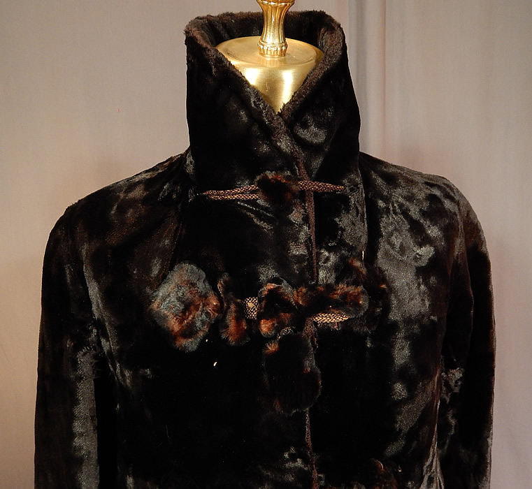 Victorian Womens Plush Velvet Beaver Fur Winter Coat Jacket
This wonderful womens winter coat jacket is a long mid length, with long full sleeves, wide rolled cuffs, an upturned collar which can be worn folded down, fur button toggle closures down the front and is fully lined in a reddish brown quilted silk fabric with an inside bow trimmed slit pocket near the front opening.