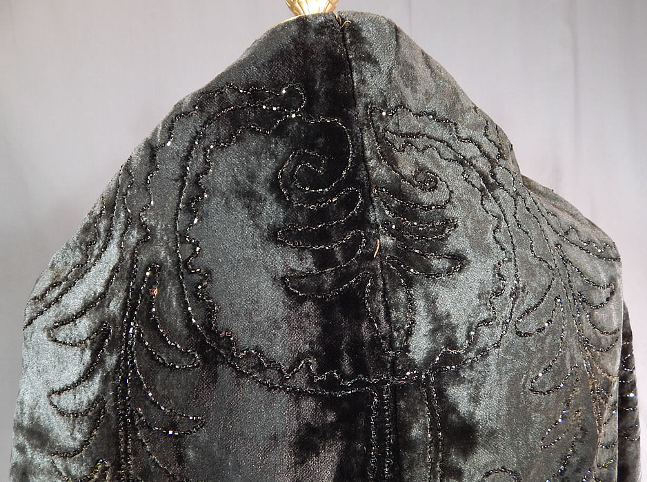 Victorian Black Plush Velvet Jet Beaded Ball Trim Winter Cloak Cape Capelet
The cape measures 23 inches long in the front, 19 inches long in the back and is 20 inches wide at the shoulders. 