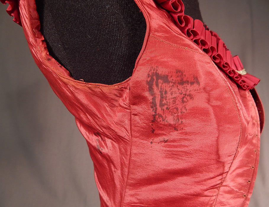 Victorian Civil War Era Red Silk White Beaded Ball Gown Bodice Corset Top
It is in good as-is condition, with some stains under the arms and on the inside lining. This is truly a wonderful rare red color piece of antique Victoriana wearable art! 