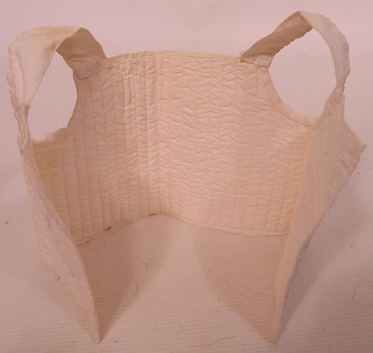 Victorian Antique Doll Infant Child Corset Stays Cotton Quilted Undergarment. This beautiful baby infant child's corset stays undergarment bodice top is sleeveless, with shoulder straps, a squared neckline and open front with no closure. 