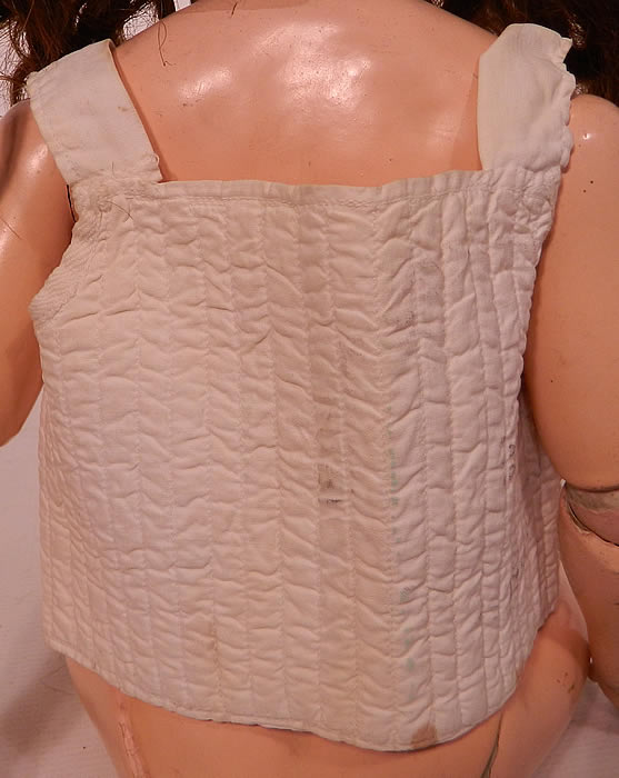 Victorian Antique Doll Infant Child Corset Stays Cotton Quilted Undergarment. Doll not included. It could also possibly be for a large doll as I have it being modeled on my 22 inch antique German bisque head jointed composition body doll. 