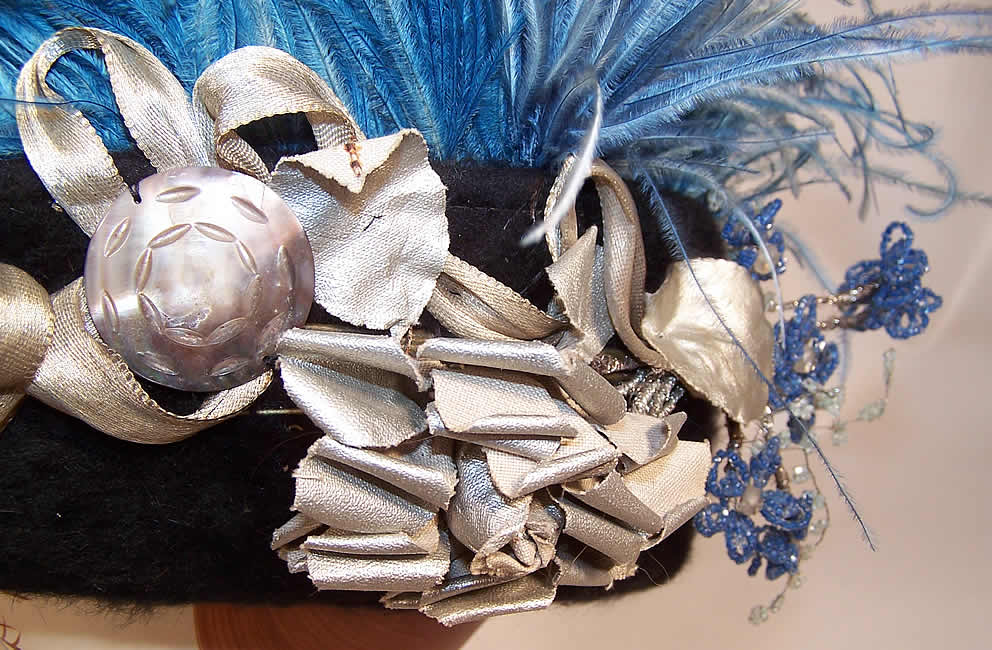 Edwardian Black Beaver Felt Fur Blue Feather Silver Lam&eacute; Ribbon Floral Hat close up.