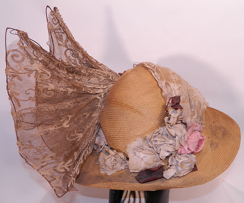 Edwardian Woven Natural Straw Tambour Net Lace Wired Wing Floral Wide Brim Hat. The hat measures 23 inches inside crown circumference. 