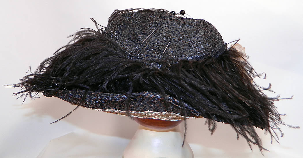 Edwardian Woven Black Straw Ostrich Feather Wide Brim Hat & Hatpins. The hat measures 23 inches inside crown circumference and 48 inches outside. 