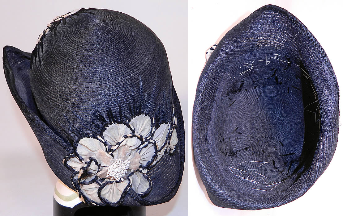 Vintage Black Straw Upturned Brim White Silk Flower Flapper Cloche Hat. It is unlined and the fabric appears to have been removed. The hat is a large size measuring 25 inches inside crown circumference. 