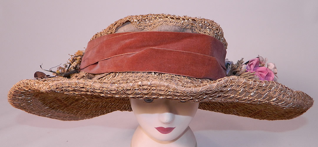 Edwardian Titanic Belle Epoque Woven Natural Straw Silk Flower Wide Brim Hat. This antique Edwardian Titanic era Belle Epoque woven natural straw silk flower wide brim hat dates from 1912.
