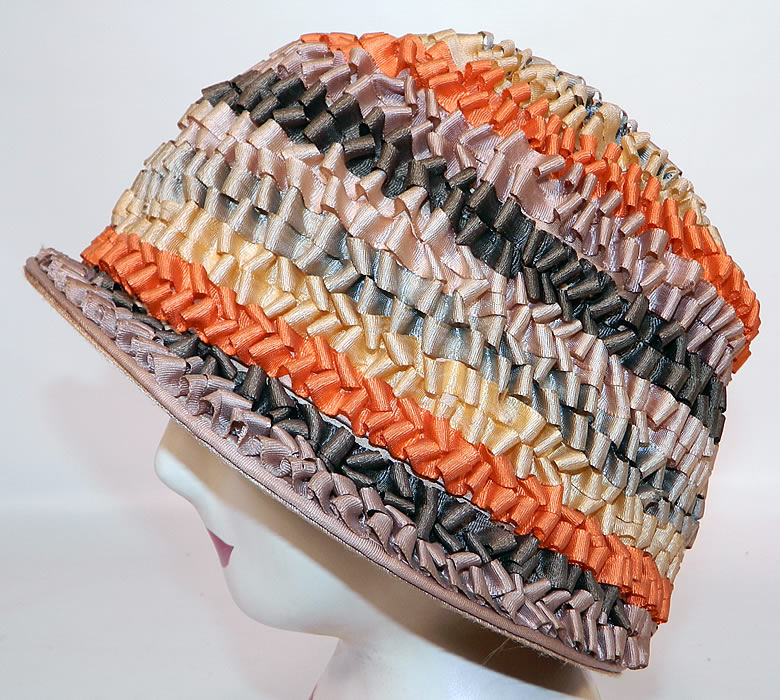 Vintage Silk Ribbon Crimp Curl Striped Rainbow Flapper Cloche Hat. It is made of a colorful rainbow stripe silk ribbon with a unique crimped curl technique trim encompassing the hat.