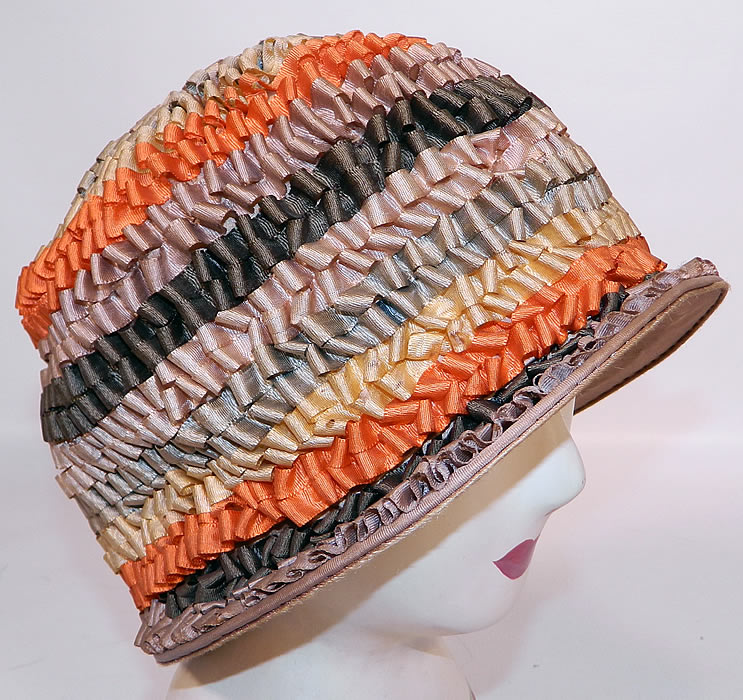 Vintage Silk Ribbon Crimp Curl Striped Rainbow Flapper Cloche Hat. This sensational summertime cloche style helmet hat has a small beige silk brim. 