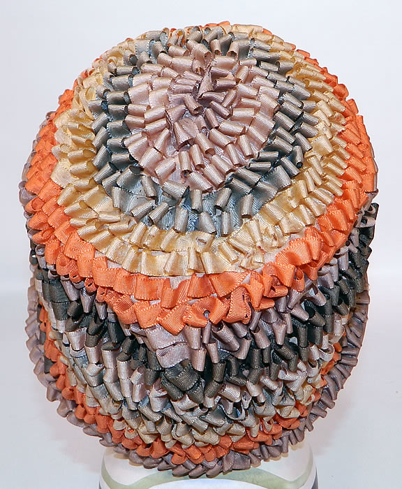 Vintage Silk Ribbon Crimp Curl Striped Rainbow Flapper Cloche Hat. The hat measures 23 inches inside crown circumference.