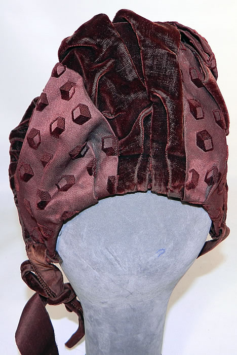 Victorian Brown Burnout Voided Velvet Silk Square Cube Print Bonnet Hat. This beautiful bonnet has a brown velvet trim brim, ribbon ties for securing under the chin and is unlined. 