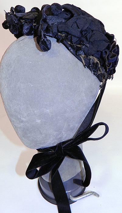 Victorian Black Silk Jet Beaded Trim Paris Label Mourning Bonnet Hat. This antique Victorian era black silk jet beaded trim Paris label mourning bonnet hat dates from the 1880s.