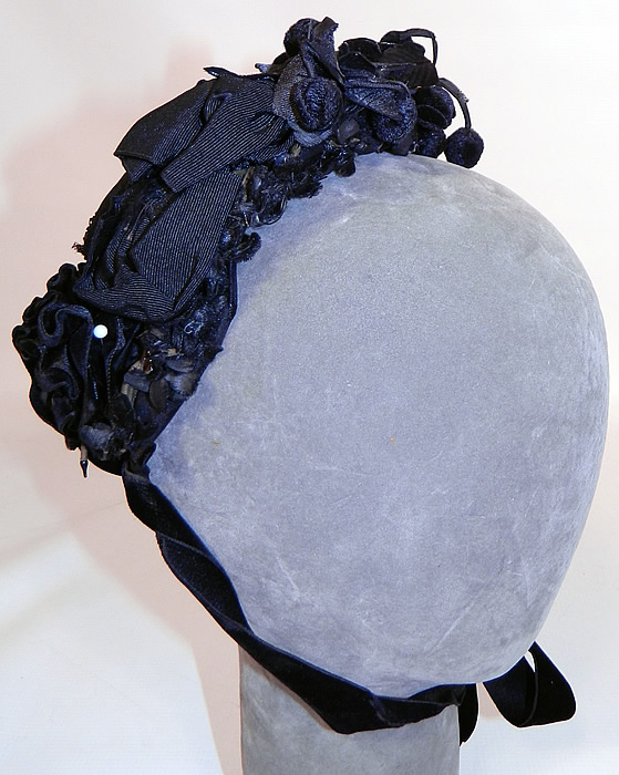 Victorian Black Silk Jet Beaded Trim Paris Label Mourning Bonnet Hat. It is made of a black silk fabric base, covered with a sheer black net  and jet beading. 