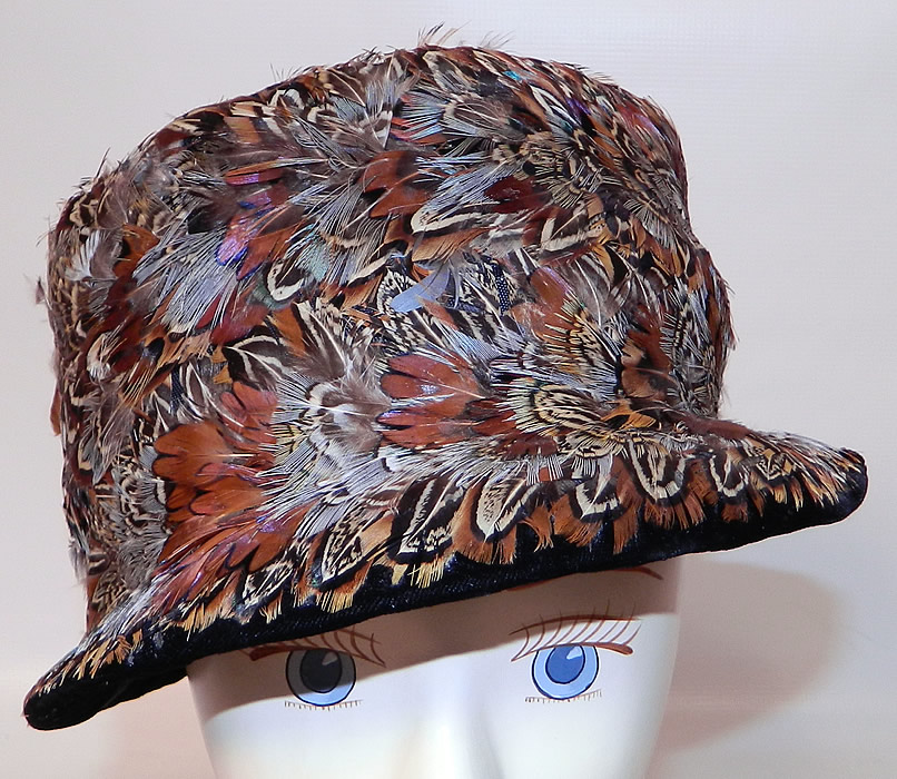 Vintage Womens Black Velvet Pheasant Feather Fedora Hat. This vintage womens black velvet pheasant feather fedora hat dates from the 1940s.