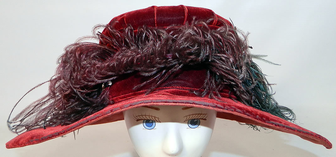 Vintage Fall Color Burgundy Red Velvet Feather Boa Trim Wide Brim Cloche Hat. This vintage fall color burgundy red velvet feather boa trim wide brim cloche hat dates from  the 1920s. 