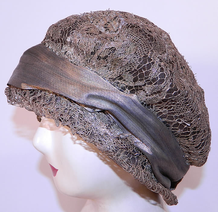Vintage Art Deco Gold Lame Lam&eacute; Lace Flapper Cloche Hat. This vintage Art Deco gold lam&eacute; lace flapper cloche hat dates from the roaring 1920s.