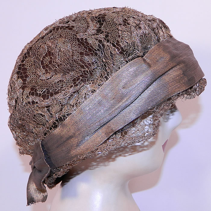 Vintage Art Deco Gold Lame Lam&eacute; Lace Flapper Cloche Hat. This fabulous flapper cloche style hat is form fitting, with a slight ruffled lace brim and gold lam&eacute; ribbon bow trim hatband.