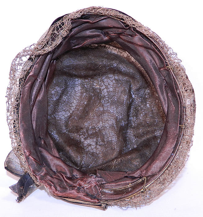 Vintage Art Deco Gold Lame Lam&eacute; Lace Flapper Cloche Hat.  It is fully lined in a sheer bronze brown color silk chiffon fabric inside. The hat measures 22 inches inside circumference.