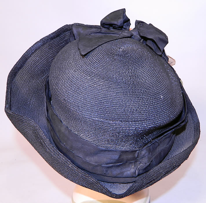 Edwardian Black Straw Orange Silk Velvet Floral Trim Upturned Wide Brim Hat.It is in good condition. This is truly a wonderful piece of wearable textile millinery art!