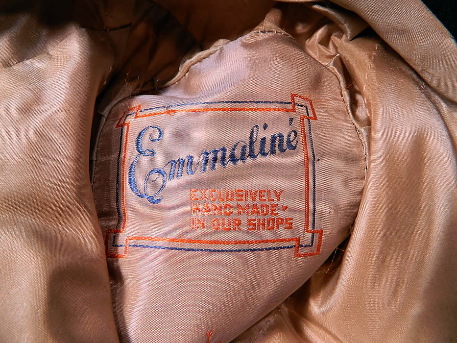 Vintage Emmaline Silver Lame Lam&eacute; Embroidered Sequin Trim Black Silk Wide Brim Cloche Hat. It is fully lined in silk, with a "Emmaline Exclusively Hand Made In Our Shops" label  inside.
