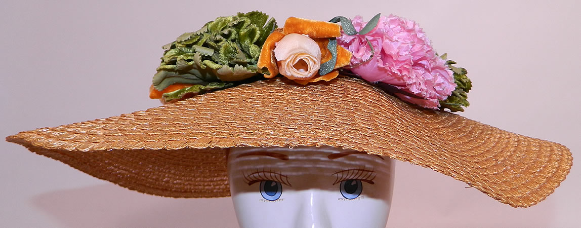 Vintage Woven Natural  Straw Silk Velvet Flowers Wide Brim Summer Cartwheel  Hat. It is made of a tightly woven natural straw, with a colorful floral hatband made of a variety of silk, velvet flowers encircling the crown. 