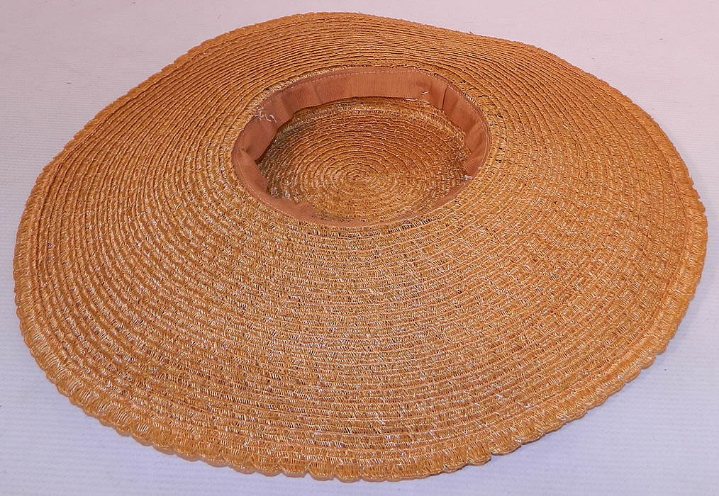 Vintage Woven Natural  Straw Silk Velvet Flowers Wide Brim Summer Cartwheel  Hat. The hat measures 18 inches in circumference inside the crown and 50 inches outside. It is in good condition. This is truly a wonderful piece of wearable textile millinery art!