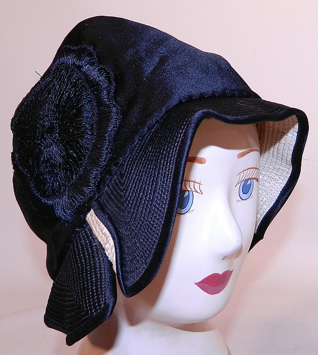 Vintage Marcelle Hats Art Deco Black  & White Silk Rosette Quilted Brim Flapper Cloche. This vintage Marcelle Hats Art Deco black and white silk rosette quilted brim flapper cloche dates from the 1920s.
