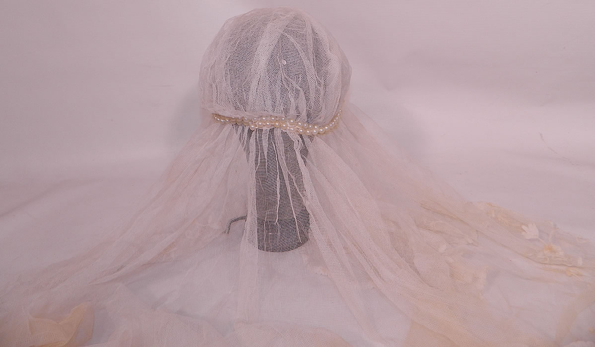 Vintage Pearl Beaded Cap Long Princess Lace Net Wedding Veil. The veil measures 60 inches long. It is in excellent condition. This is truly a wonderful wedding bridal veil headpiece which is a rare one of a kind piece of flapper bridal antique art! 