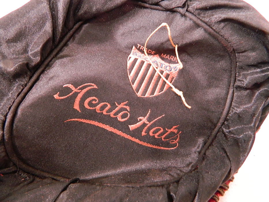 Vintage Art Deco Red Velvet Gold Lam&eacute; Soutache Trim Flapper Cloche Hat. This fabulous flapper cloche style hat is form fitting, with a slight rolled brim and is fully lined inside with black silk and an "Acato Hats" label. 