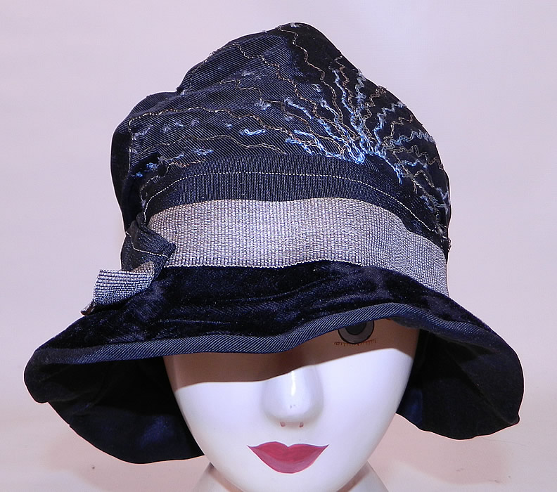 Vintage Dahlia Model Black Silk Velvet Gold Lame Lam&eacute; Embroidered Flapper Cloche Hat. This vintage Dahlia Model black silk velvet gold lam&eacute; embroidered flapper cloche hat dates from the roaring 1920s.