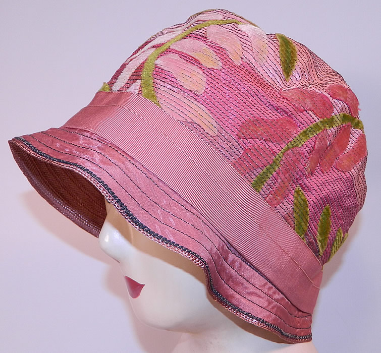 Vintage Art Deco Pink Silk Burnout Voided Velvet Floral Quilted Flapper Cloche Hat
It is made of a pink silk fabric, with a pastel floral burnout voided velvet design and decorative quilted stitching. 