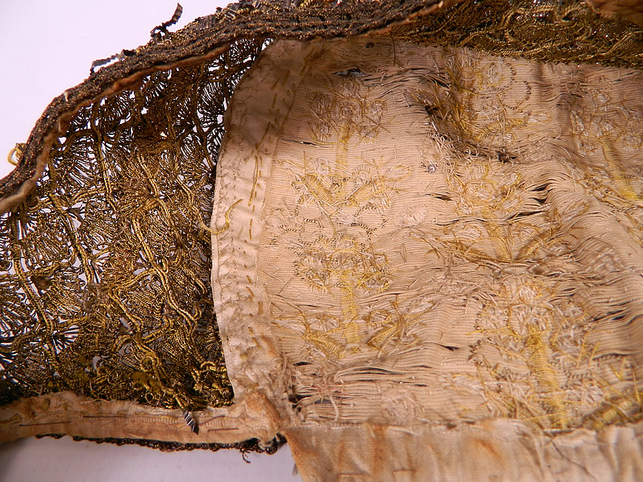 19th Century Antique Silver & Gold Bullion Jeweled German Folk Bonnet Cap
It is in good condition, with some fraying splits, stains on the inside lining and backing. The bottom trim is frayed and missing in a small area on the side. This is a truly a rare and wonderful piece of early German regional textile folk art! 